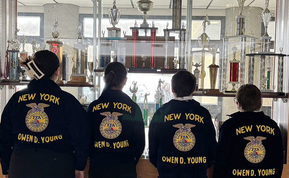 four ODY students proudly display their FFA gear