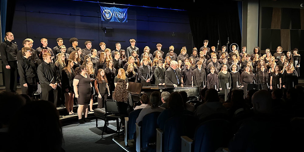 Mixed chorus performs at New York State School Music Association Zone 4 Festival