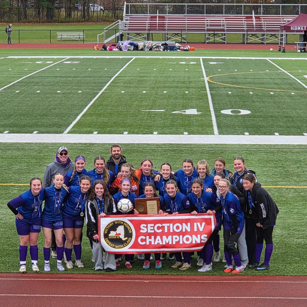 Team with their Section IV banner