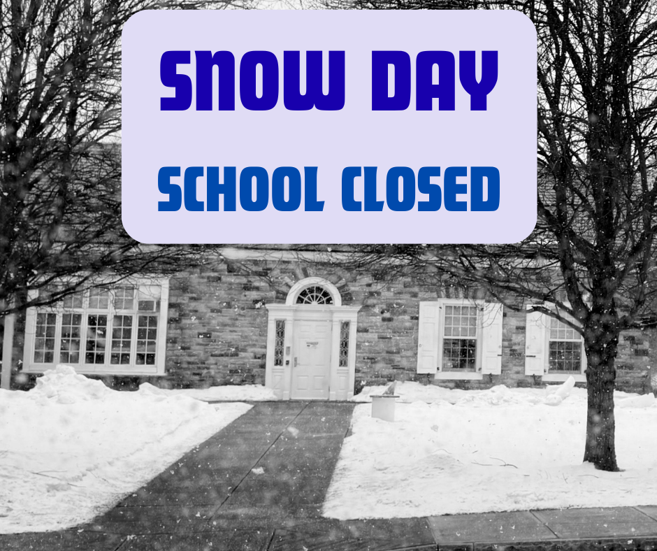 school building with surrounding snow