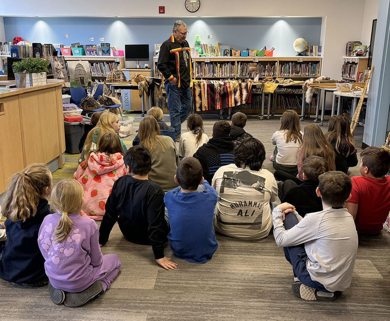 Guest speaker interacts with students during Oneid Indian Nation presentation