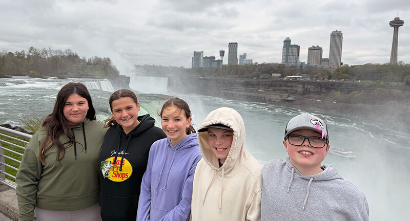 ODY FFA students stand together in an area overlooking Niagara Falls