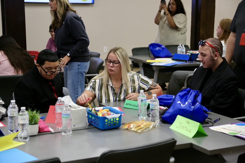 Teacher working with students