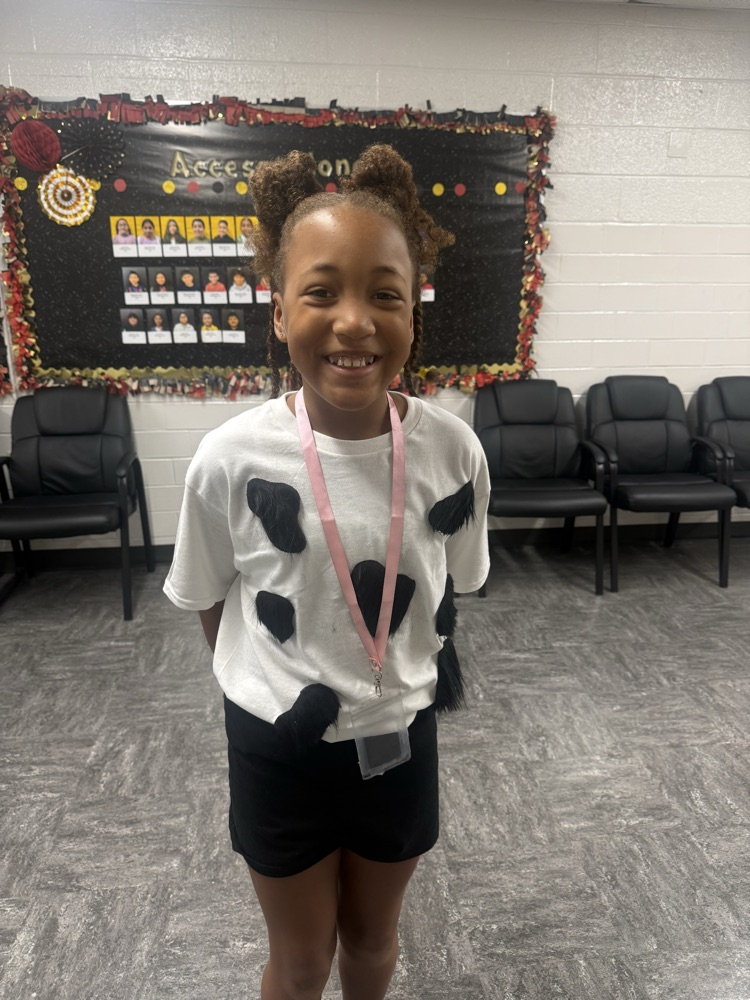 student in cow shirt