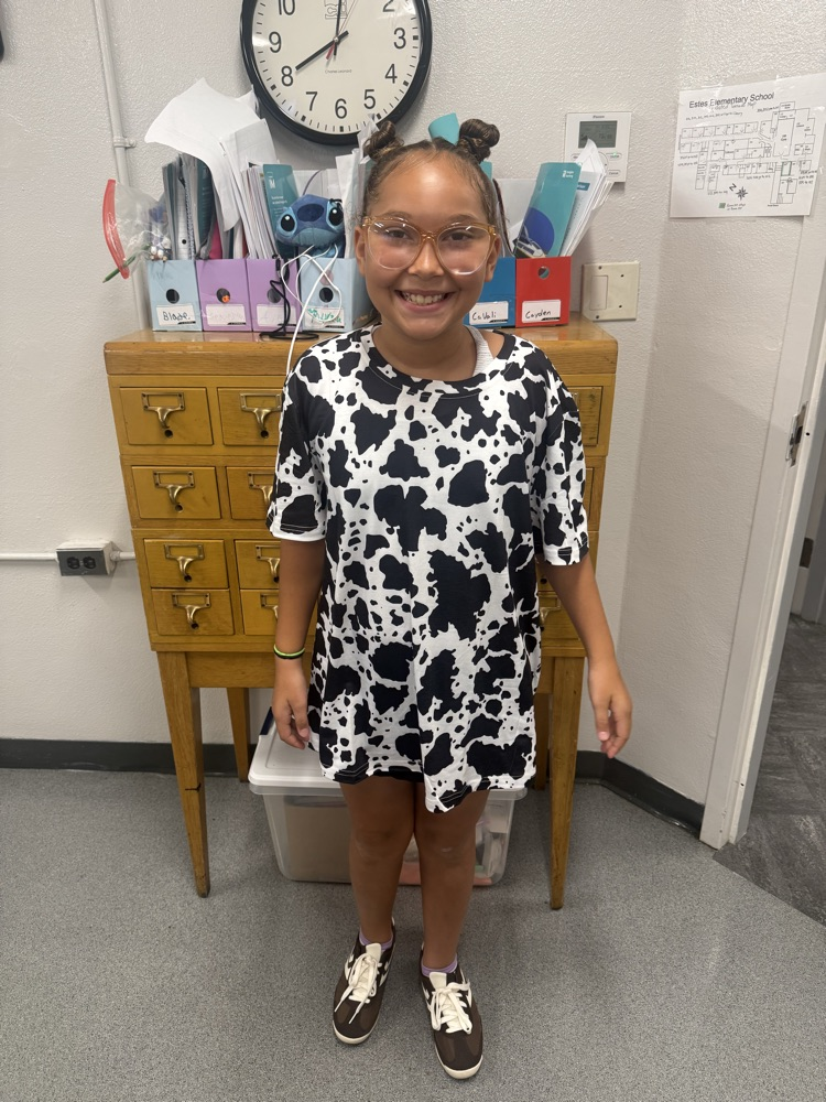 student in cow shirt
