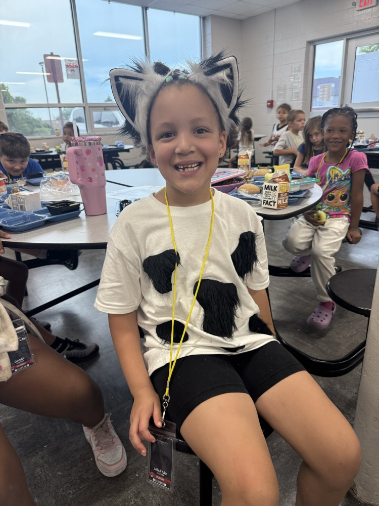 student in cow shirt
