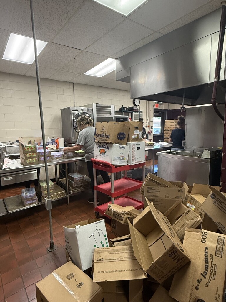 Food Service Staff preparing meals for pick ups