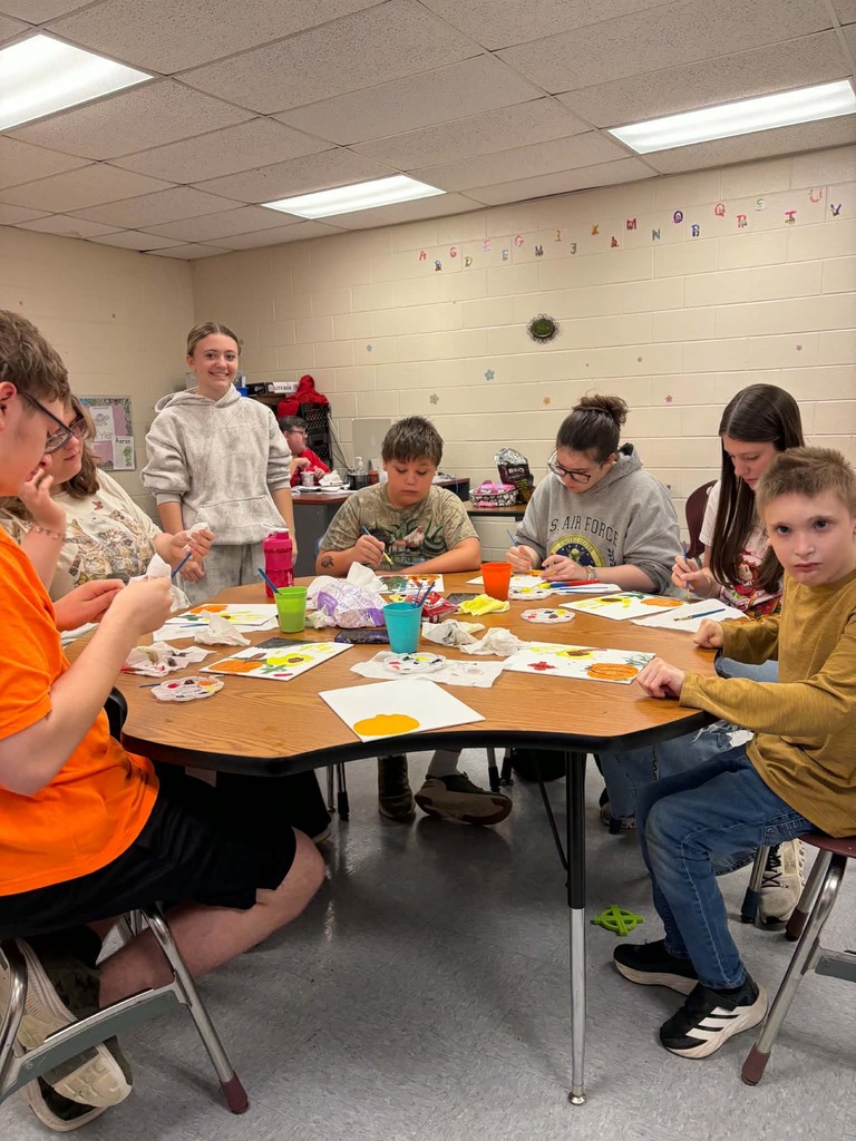 Mentor Erica Mason led a painting project in the high school FMD room today. Students created beautiful pictures using their handprints!