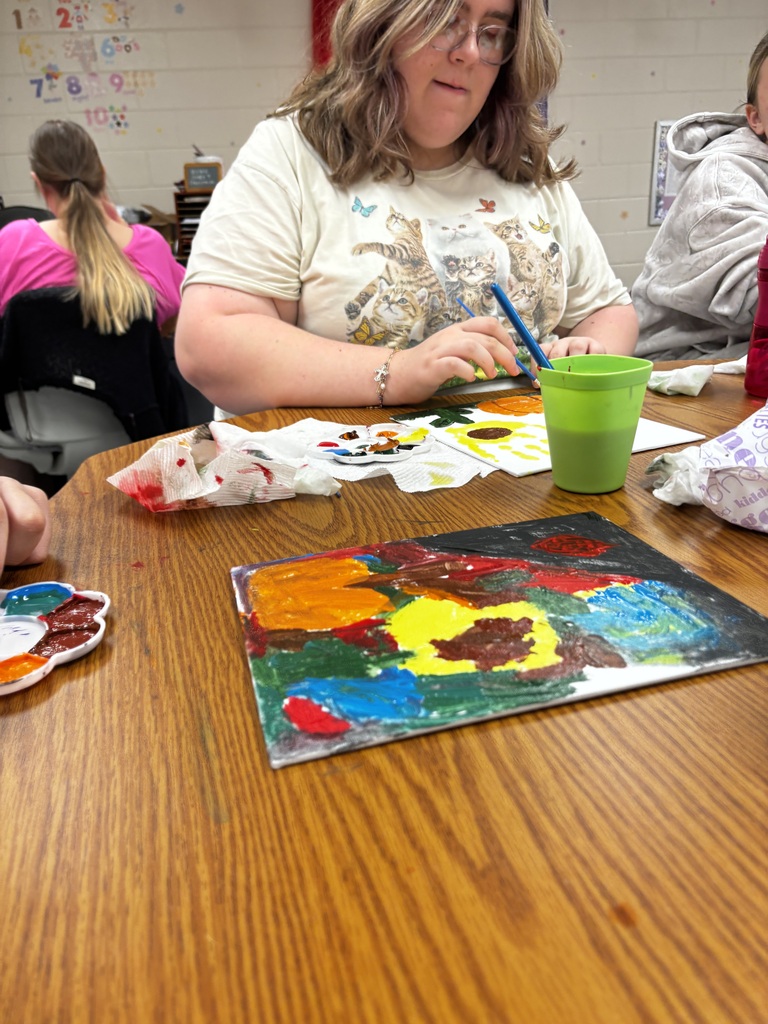 Mentor Erica Mason led a painting project in the high school FMD room today. Students created beautiful pictures using their handprints!