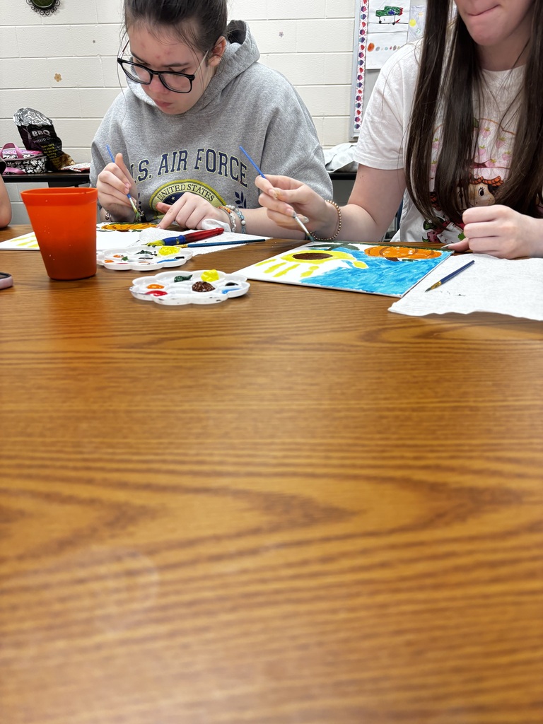 Mentor Erica Mason led a painting project in the high school FMD room today. Students created beautiful pictures using their handprints!