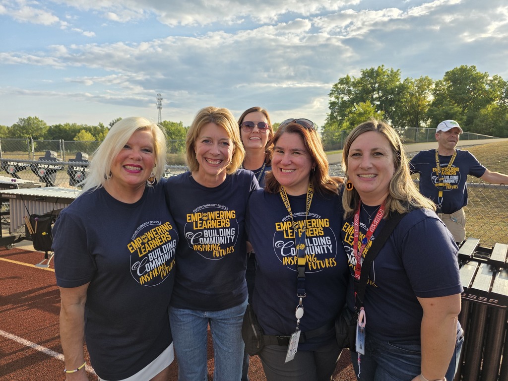 staff smiling at the camera