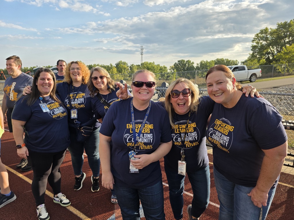 staff smiling at the camera
