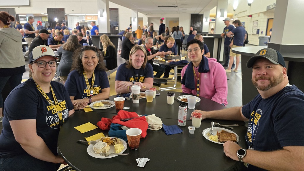IT Professionals eating breakfast together