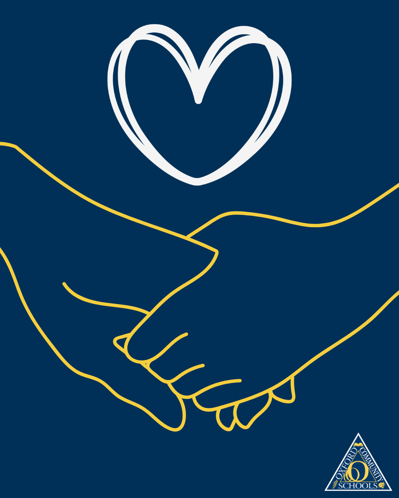 Two hands holding each other with a heart in the middle