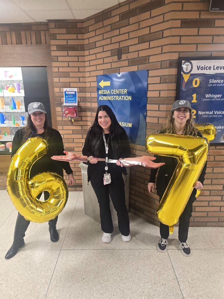 Teachers with 67 balloons