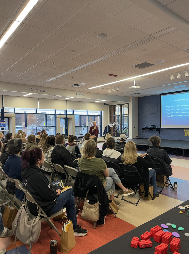 Keynote speaker, Judy, talking to a crowd of parents