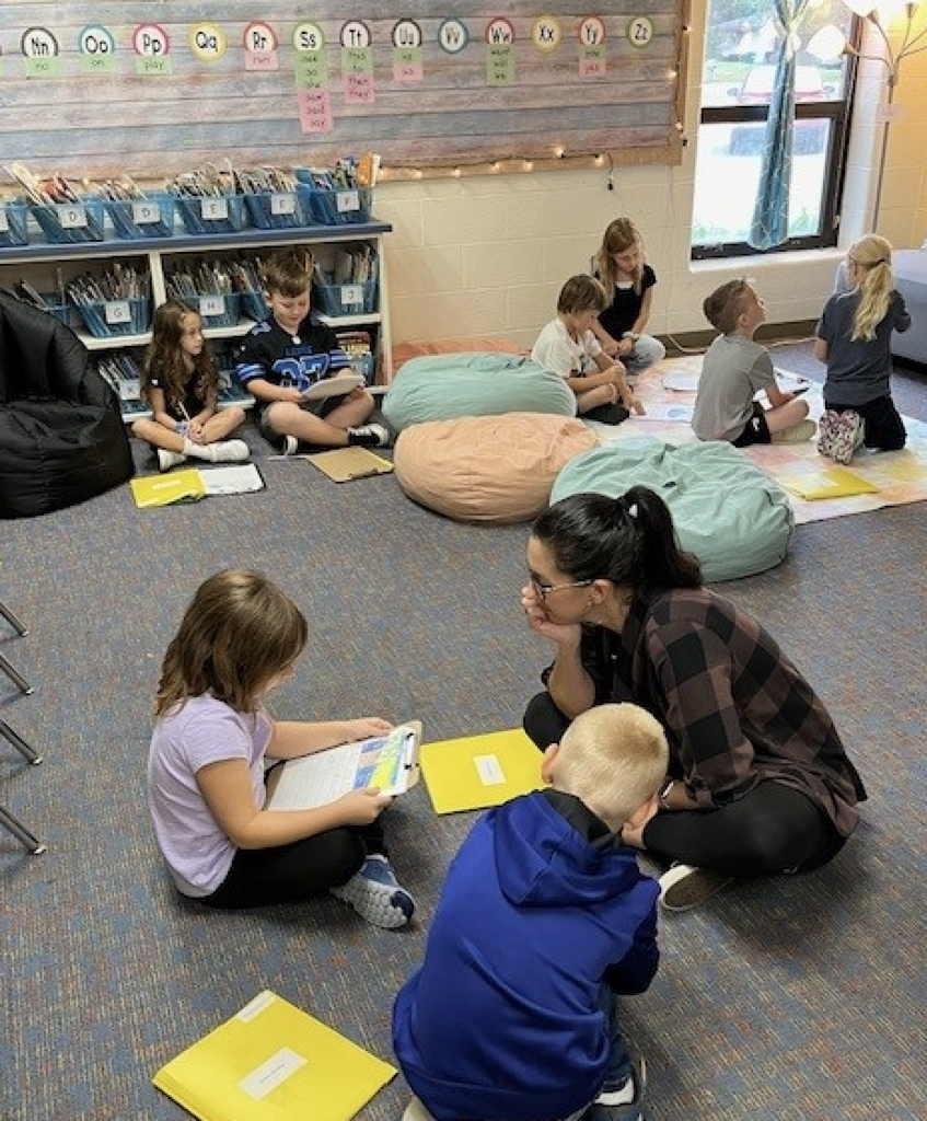 Teacher reading to kids