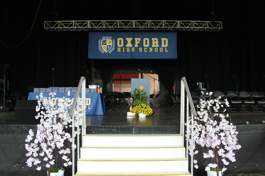 Graduation stage with Oxford High School banner