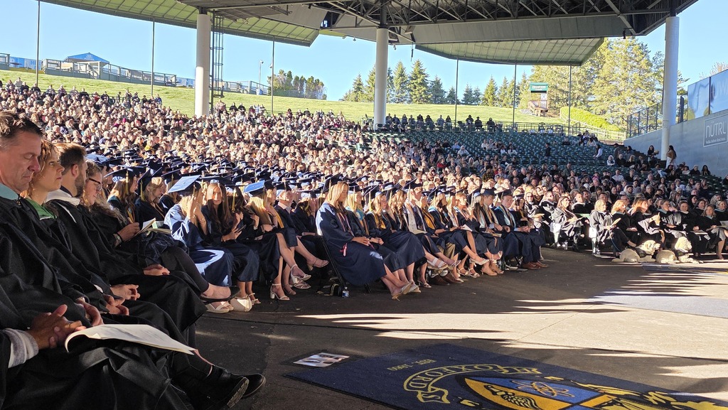 Class of 2026 sitting in their chairs