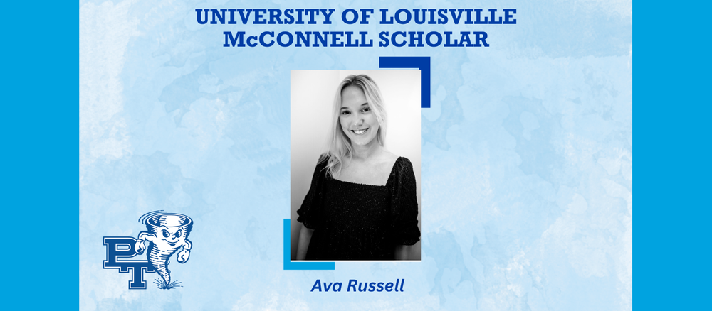 A girl in a black blouse smiles at the camera