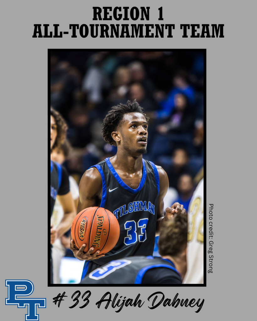 A basketball player holds a basketball, facing left. Text overlay reads "REGION 1 ALL-TOURNAMENT TEAM".