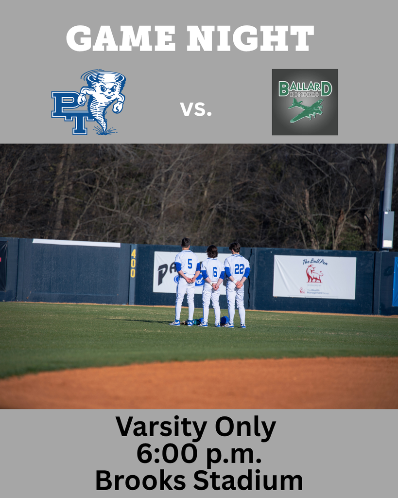 Four baseball players stand on a field, facing each other. A wall with advertisements is behind them.