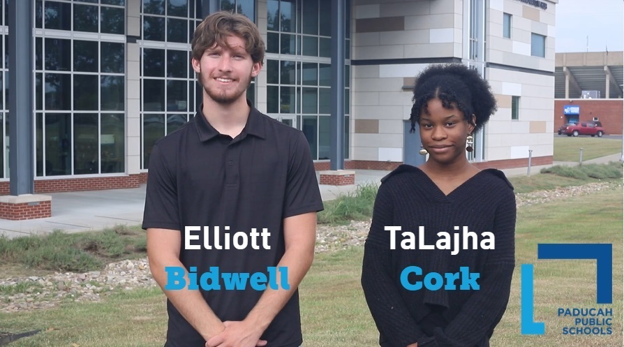 Two individuals stand in front of a building with large windows. A man is named Elliott Bidwell and a woman is TaLajha Cork.