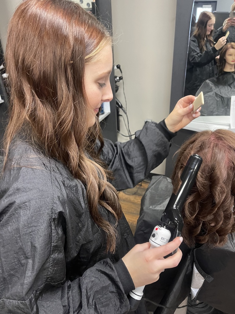 Student curing hair
