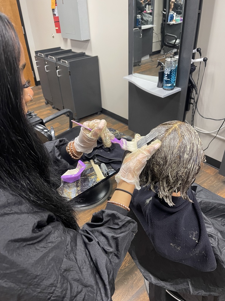 Student coloring hair