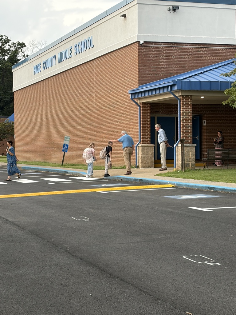 students walking into the building