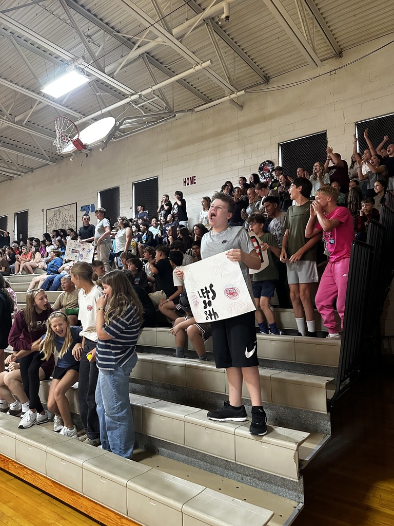 8th grade students cheering