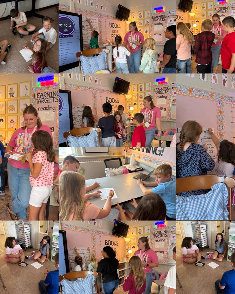 Fourth graders work together to create and sign their classroom agreement.