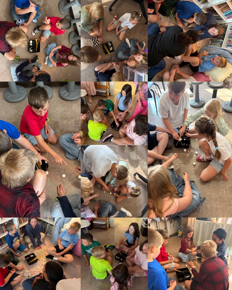 Fourth graders work in teams to build the tallest tower using spaghetti and marshmallows.