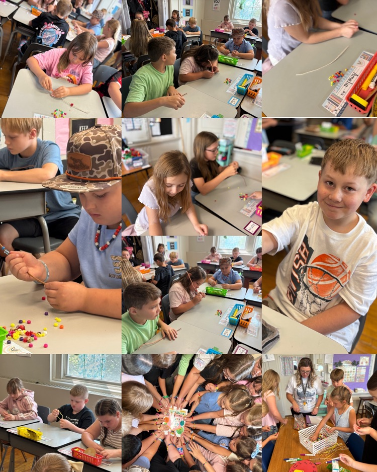  Fourth graders make friendship bracelets after reading Our Class Is a Family.