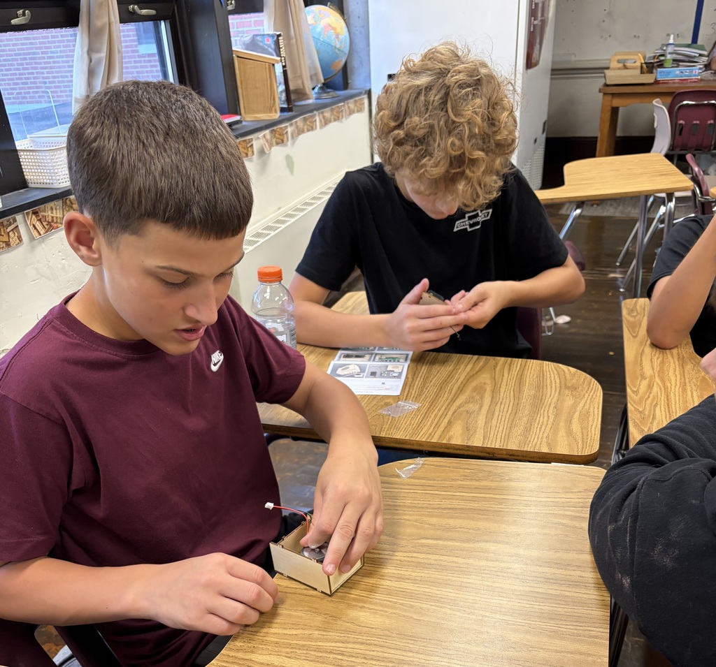 Students working on constructing their radios
