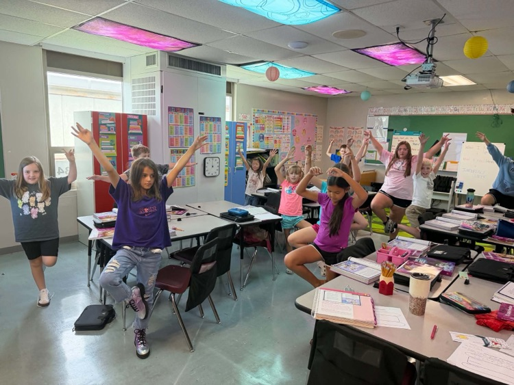 4th grade practicing yoga
