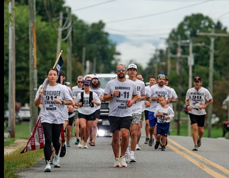 Officers running with 9/11 flag