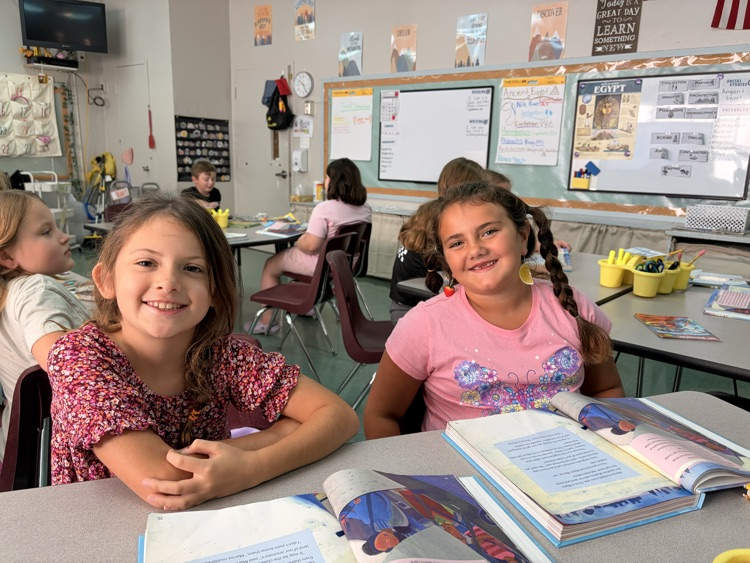 two girls with crazy hair