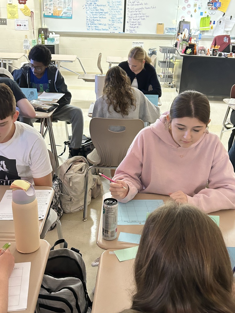 Honors Biology Students conducting activity with cell organelles