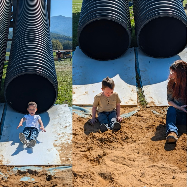 kids sliding down tube 