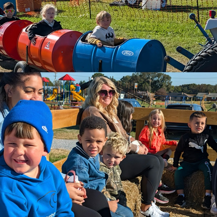 kids on hay ride and barrel train 