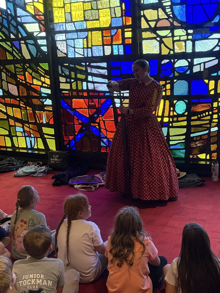 kids listening to a speaker