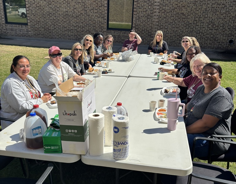 Group around table at picnic