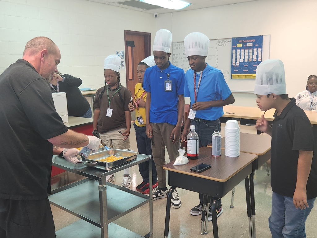 Today Life Skills class participated in a food service demonstration given by Justin Fincke. He made peaches and homemade whipped cream. The students received a certificate of participation in SRE's roving chef culinary class. Thank you Chef Justin!