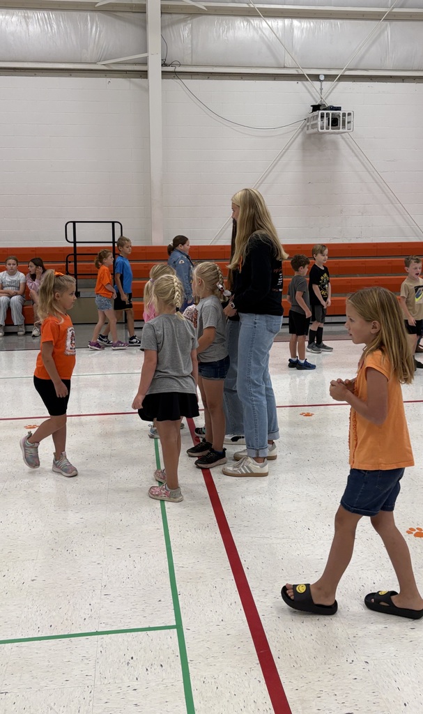 Cheer helping with morning duty in the gym