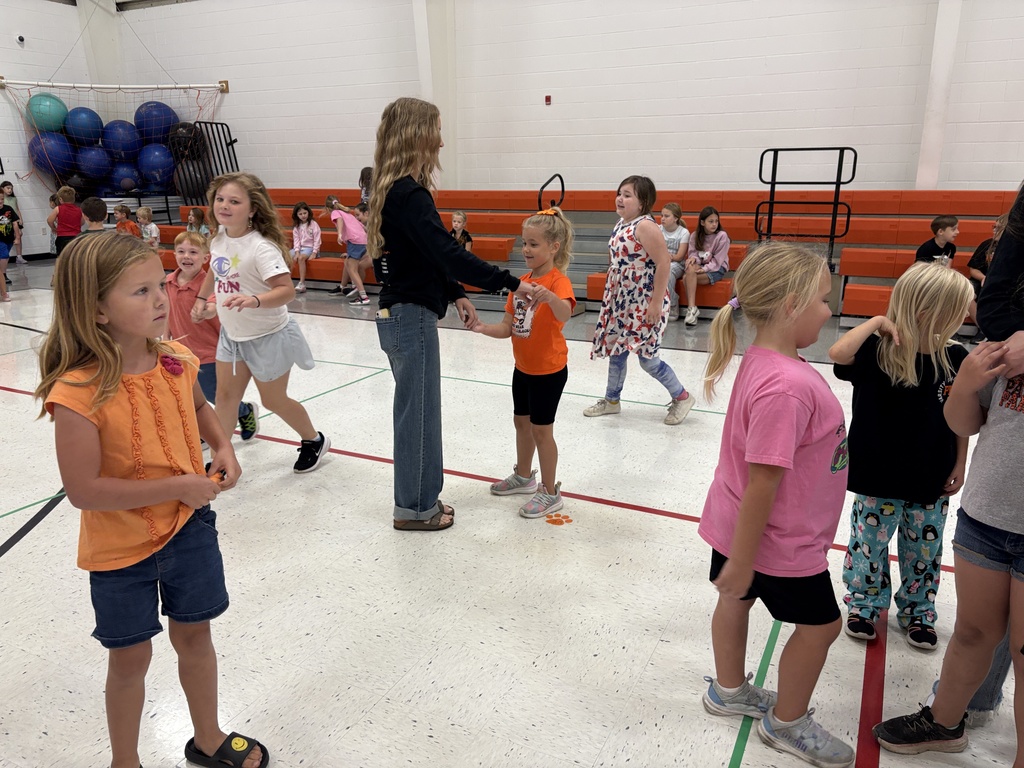 Cheer helping with morning duty in the gym