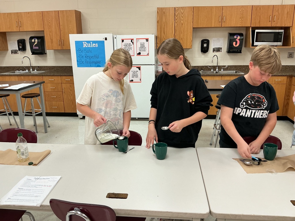 FACS 6th grade making Microwave Mug Pizza