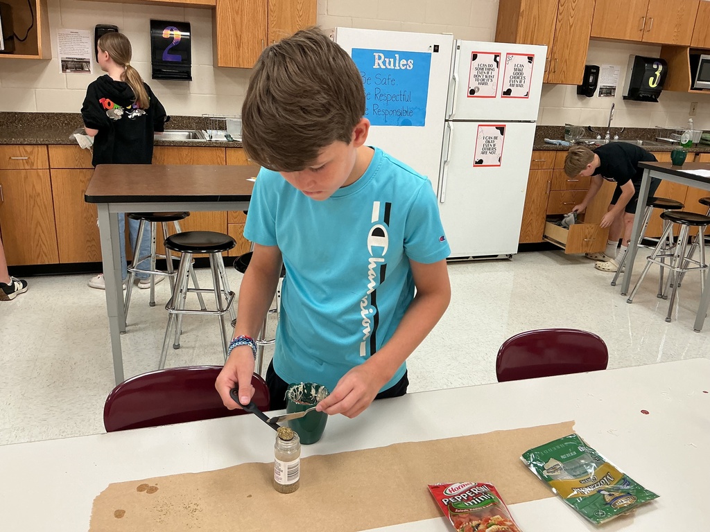 FACS 6th grade making Microwave Mug Pizza