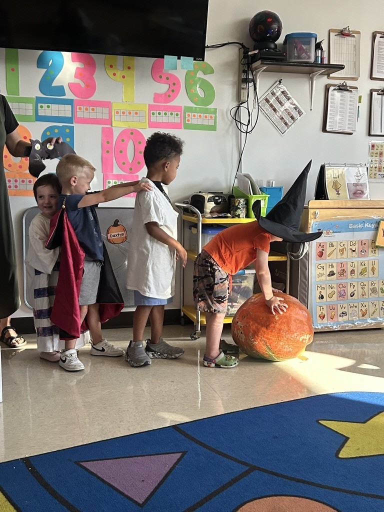Prek students performing a play about pumpkins