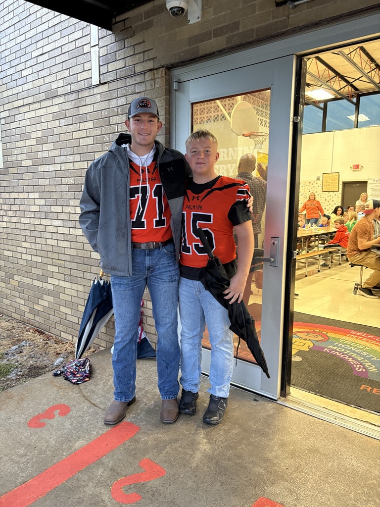 Football players greet kids at PES